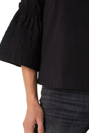 Woven Knit Embroidered Sleeve Top